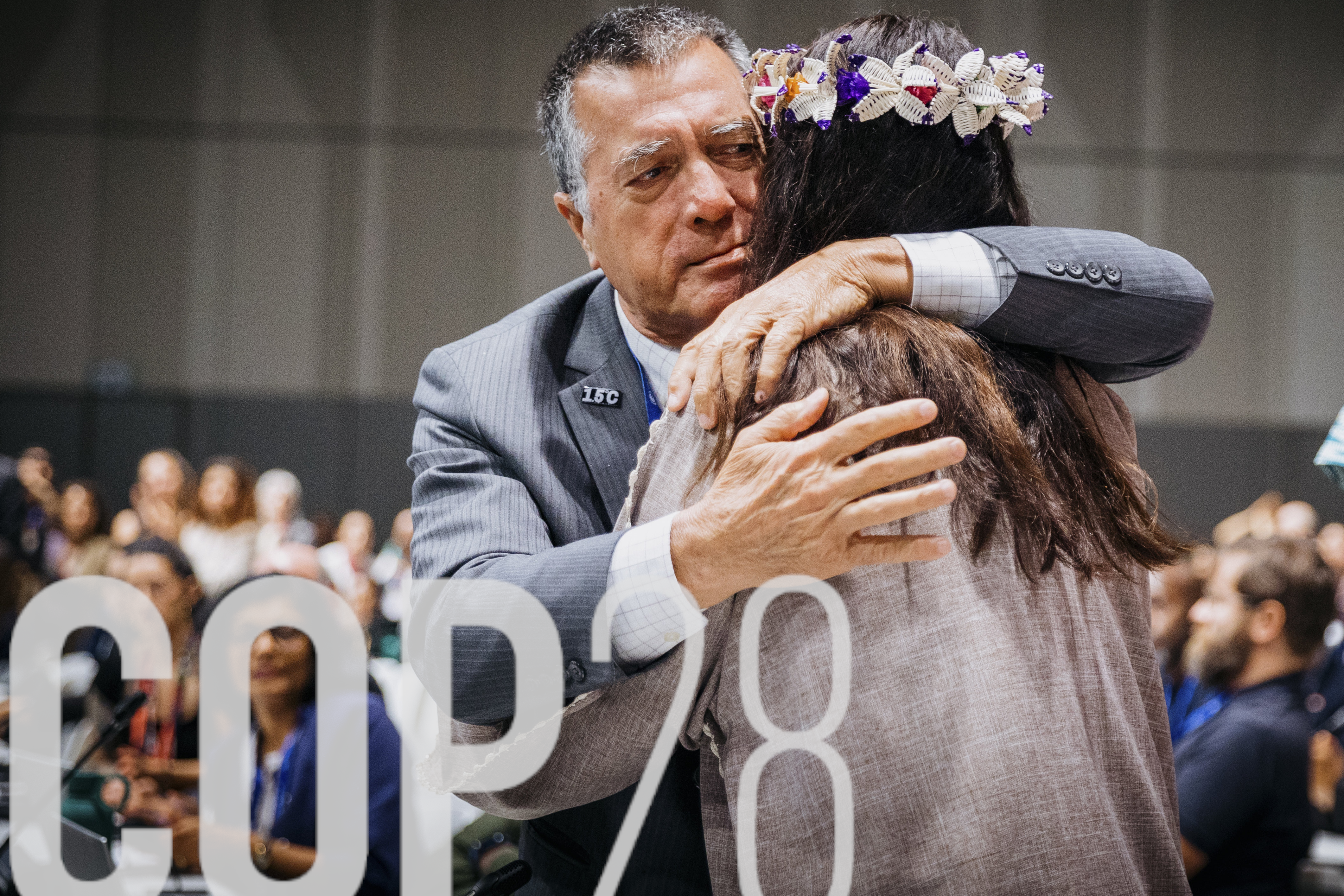 Delegation of the Marshall Islands hugging each other, taken during the final session in the plenary of COP28 in Dubai, 13 December 2023.