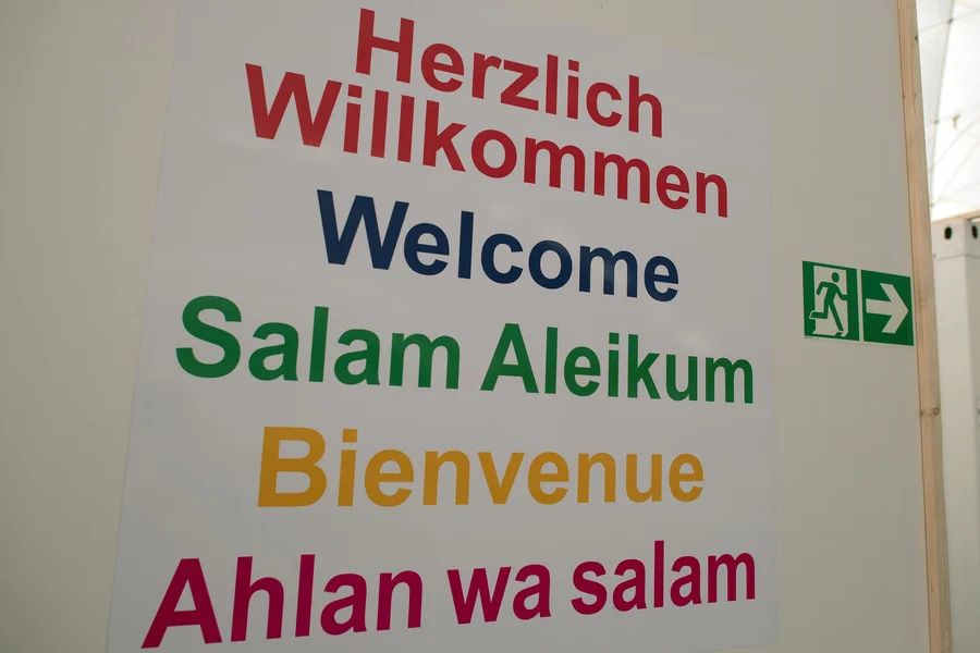A sign bearing the word 'Welcome' in various languages