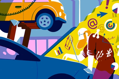 Mann, der in einer Autowerkstatt arbeitet