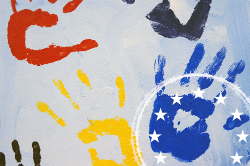 Colourful handprints of children with the logo of the GEAS article series of the FES