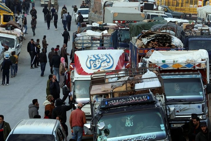 Syrian refugees prepare to return to Syria from Wadi Hmayyed on the outskirts of the Lebanese border town of Arsal.